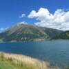 Blick auf den Reschensee mit Graun, dem Grauner K&ouml;pfl. Dahinter die Klopaier Spitze, welche die Grenze zu &Ouml;sterreich bildet. Foto: AT, &copy; Peer