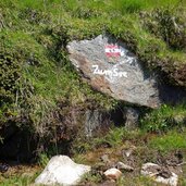 forstweg zur gruenbachalm wegweiser see