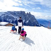 seiser alm winter schlern rodel menschen