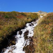 wasserfall dahinter schwenzerspitzen