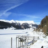 reschensee vinschgau winter zugefroren gefroren