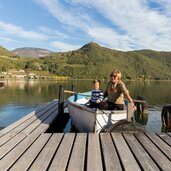 kalterersee herbst personen boot