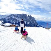 seiser alm winter schlern rodel menschen