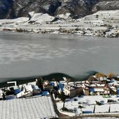 DJI winter kalterersee klughammer dahinter st josef am see