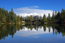 puntleider see herbst dahinter pfunderer berge