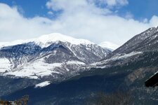 blick richtung schlanders sonnenberg winter