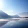 Montiggler See halb zugefroren Schnee