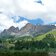 karersee bei golfclub dahinter rosengarten