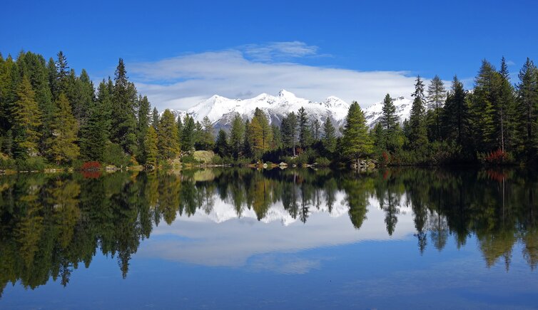 puntleider see herbst dahinter pfunderer berge