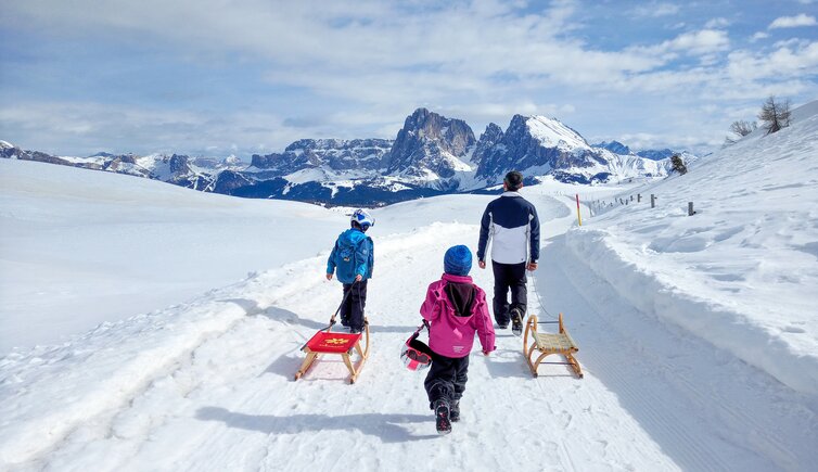 seiser alm winter puflatsch menschen rodel langkofel plattkofel sella