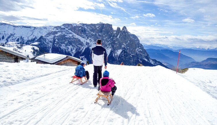 seiser alm winter schlern rodel menschen